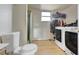 Functional laundry room with a washing machine, dryer and standing shower at 2551 S Carson Way, Aurora, CO 80014