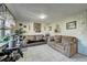 Inviting living room with neutral tile flooring and two comfortable sofas at 2551 S Carson Way, Aurora, CO 80014