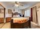Spacious main bedroom featuring a large window and a ceiling fan at 2551 S Carson Way, Aurora, CO 80014
