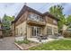 Home featuring a backyard with a patio, outdoor furniture, and outdoor cooking area at 1410 S Elizabeth St, Denver, CO 80210
