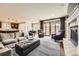 Open-concept living room leads to a dining area and kitchen, great for entertaining at 1410 S Elizabeth St, Denver, CO 80210