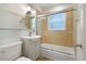 Cozy bathroom featuring a shower and bathtub combination at 1111 Kearney St, Denver, CO 80220