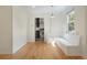 Charming dining room featuring a built-in bench and hardwood flooring at 1111 Kearney St, Denver, CO 80220