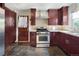 Traditional kitchen with stainless steel appliances and lots of cabinet space at 1111 Kearney St, Denver, CO 80220