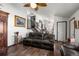 Hardwood floors in living room complement the open floor plan, offering ample space for relaxation and entertaining at 8571 S Estes St, Littleton, CO 80128