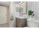 Bathroom featuring neutral tones, tiled floor, and single vanity at 8335 Fairmount Dr # 10-208, Denver, CO 80247