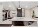 Bright kitchen with large island and bar seating, perfect for entertaining at 8335 Fairmount Dr # 10-208, Denver, CO 80247