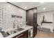 Updated kitchen with stainless steel appliances, ample cabinets and subway tile backsplash at 8335 Fairmount Dr # 10-208, Denver, CO 80247
