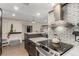 Open concept kitchen with stainless appliances, modern countertops, and ample storage space at 8335 Fairmount Dr # 10-208, Denver, CO 80247