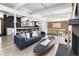 Beautiful open-concept living space with modern decor, a stylish fireplace, and spacious layout at 1321 S Edison Way, Denver, CO 80222