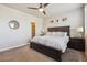 Serene bedroom featuring a spacious layout, plush carpeting, and ample natural light for a relaxing retreat at 6834 Clay N St, Denver, CO 80221