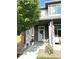 Inviting front entrance with a wreath on the door and an American flag waving at 6834 Clay N St, Denver, CO 80221