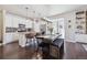 Stylish kitchen featuring white cabinetry, stainless steel appliances, and a large island at 6834 Clay N St, Denver, CO 80221