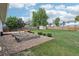 Large backyard with garden beds, deck, and storage shed, perfect for outdoor living and gardening enthusiasts at 4759 S Xenophon St, Morrison, CO 80465