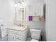 Cozy bathroom features vanity sink and medicine cabinet at 4759 S Xenophon St, Morrison, CO 80465