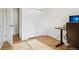Bright bedroom featuring a closet, wood floors and natural light at 4759 S Xenophon St, Morrison, CO 80465