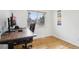 Bedroom with light wood floors, natural light, desk and an office chair at 4759 S Xenophon St, Morrison, CO 80465