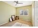 Bedroom featuring carpet floors, a ceiling fan and a window with natural light at 4759 S Xenophon St, Morrison, CO 80465