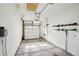 Two-car garage featuring ski racks and storage at 4759 S Xenophon St, Morrison, CO 80465