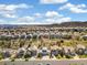 Expansive aerial view of a residential neighborhood with mountain views in the distance at 2208 Bellavista St, Castle Rock, CO 80109