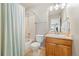 Bathroom with a shower-tub combination, and neutral-colored vanity and countertop at 2208 Bellavista St, Castle Rock, CO 80109