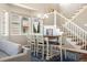 Charming dining area featuring a wooden table, seating for six, and natural light from the nearby window at 2208 Bellavista St, Castle Rock, CO 80109