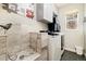 Functional laundry room with pet shower, modern appliances, and ample storage space at 2208 Bellavista St, Castle Rock, CO 80109