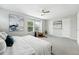 Bright main bedroom with soft carpet, large windows and two closets at 2648 Florence St, Denver, CO 80238