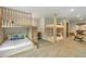 Shared bedroom featuring custom bunkbeds with integrated ladders, and a full size bed at 563 Cr 672, Breckenridge, CO 80424