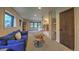 Bright bedroom with bunk beds, large windows, and comfortable blue couch at 563 Cr 672, Breckenridge, CO 80424