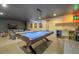 Finished basement with a billiards table, kitchenette, and comfortable seating at 563 Cr 672, Breckenridge, CO 80424
