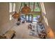A bright living room featuring an open floor plan with natural wood and oversized windows to a deck with seating at 563 Cr 672, Breckenridge, CO 80424