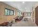 Bright living room featuring wood paneled walls and stylish furnishings at 563 Cr 672, Breckenridge, CO 80424