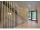 View of open staircase with wooden details and modern lighting at 563 Cr 672, Breckenridge, CO 80424