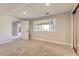 Finished basement featuring a walk-out and new carpet at 11715 Crow Hill Dr, Parker, CO 80134