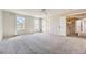 Spacious bedroom with lots of natural light, neutral walls, carpet and ceiling fan at 11715 Crow Hill Dr, Parker, CO 80134