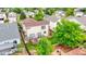 Aerial view of the backyard featuring a deck, trees, and a lawn at 22160 Wintergreen Way, Parker, CO 80138