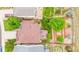 Birds eye view of backyard featuring patio, trees and a lawn at 22160 Wintergreen Way, Parker, CO 80138