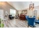 Open dining area with a bar, comfortable seating, and elegant decorative accents at 22160 Wintergreen Way, Parker, CO 80138