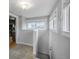 Bonus room leads to kitchen, basement stairs, and side entry at 833 Osceola St, Denver, CO 80204