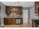 Modern kitchen featuring granite countertops, stainless steel appliances and hardwood floors at 833 Osceola St, Denver, CO 80204