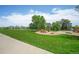 Lush green park featuring playgrounds, mature trees and scenic views at 833 Osceola St, Denver, CO 80204