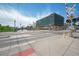 Neighborhood street view of railroad crossing featuring apartment complex and easy access to public transportation at 833 Osceola St, Denver, CO 80204