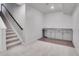 Basement with a bar area, cabinets, and stylish flooring at 10912 Memphis Ct, Commerce City, CO 80022