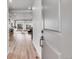 Modern entryway with light wood flooring and bright natural light at 10912 Memphis Ct, Commerce City, CO 80022