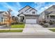 Beautiful two-story home boasts stone accents and a large two car garage at 10912 Memphis Ct, Commerce City, CO 80022