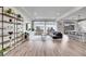 Spacious living room with hardwood floors and contemporary decor at 10912 Memphis Ct, Commerce City, CO 80022