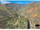 Aerial view features trails, a tunnel and a bridge near Clear Creek at 80 Clear Creek Ln # 10, Golden, CO 80403