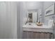 Clean bathroom with a vanity, artwork, and a large mirror, perfect for a refreshing start to the day at 80 Clear Creek Ln # 10, Golden, CO 80403