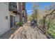 Private patio features outdoor dining, grill, seating area and river views at 80 Clear Creek Ln # 10, Golden, CO 80403